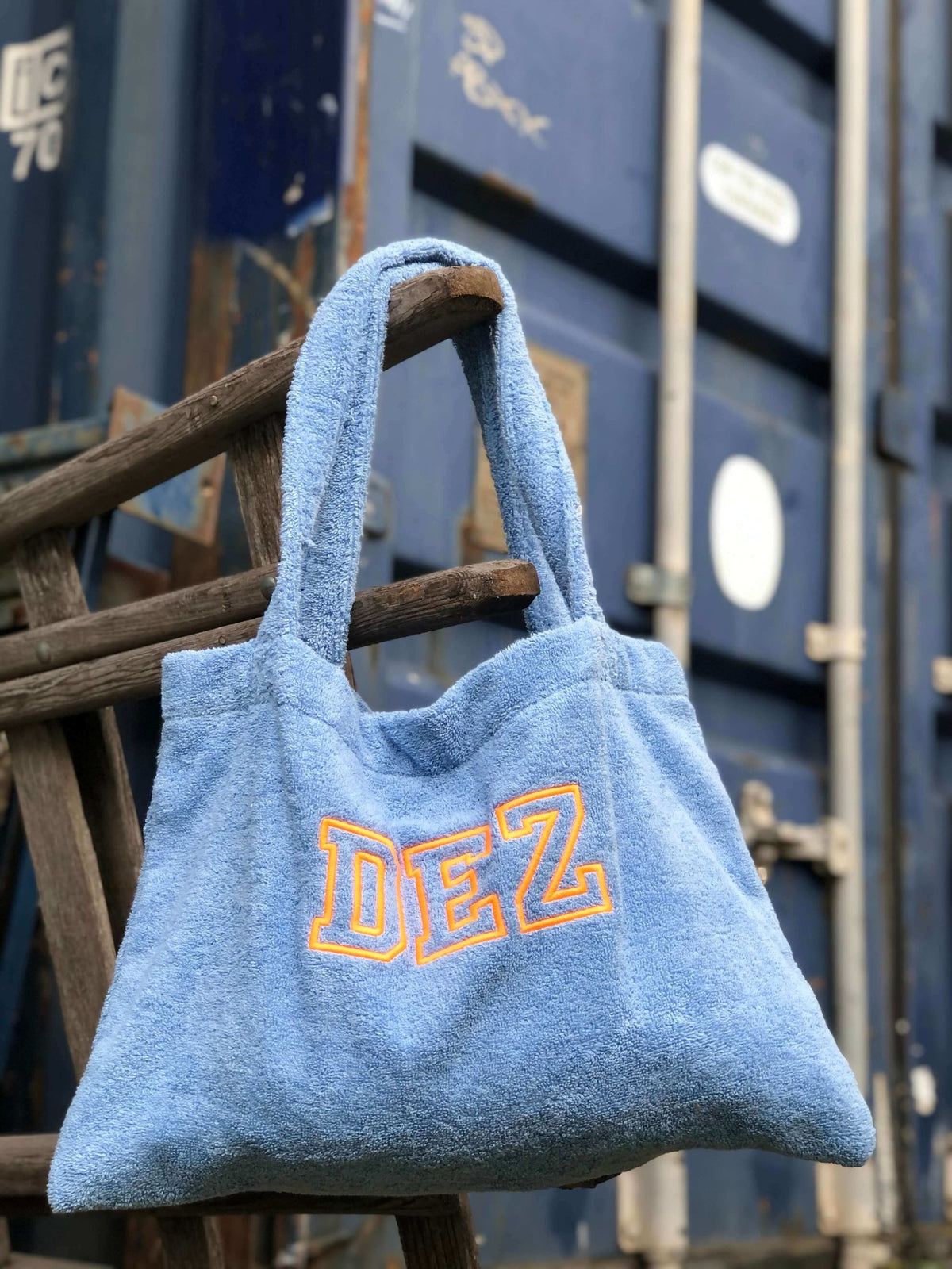 Denim badstof tas met neon-oranje borduring