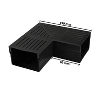 Photo cotée de la pièce d'angle UDP 100 avec grille noire. Arête extérieure 199 mm, arête intérieure 90 mm #A0003391