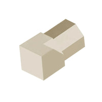 Zbliżenie diamentowego narożnika wewnętrznego DURAL do profilu diamentowego z aluminium w kolorze piaskowym.