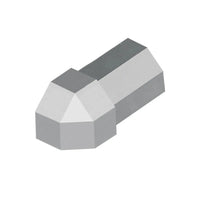 Gros plan d'un angle extérieur DURAL en forme de diamant pour le profilé diamant en aluminium gris béton.